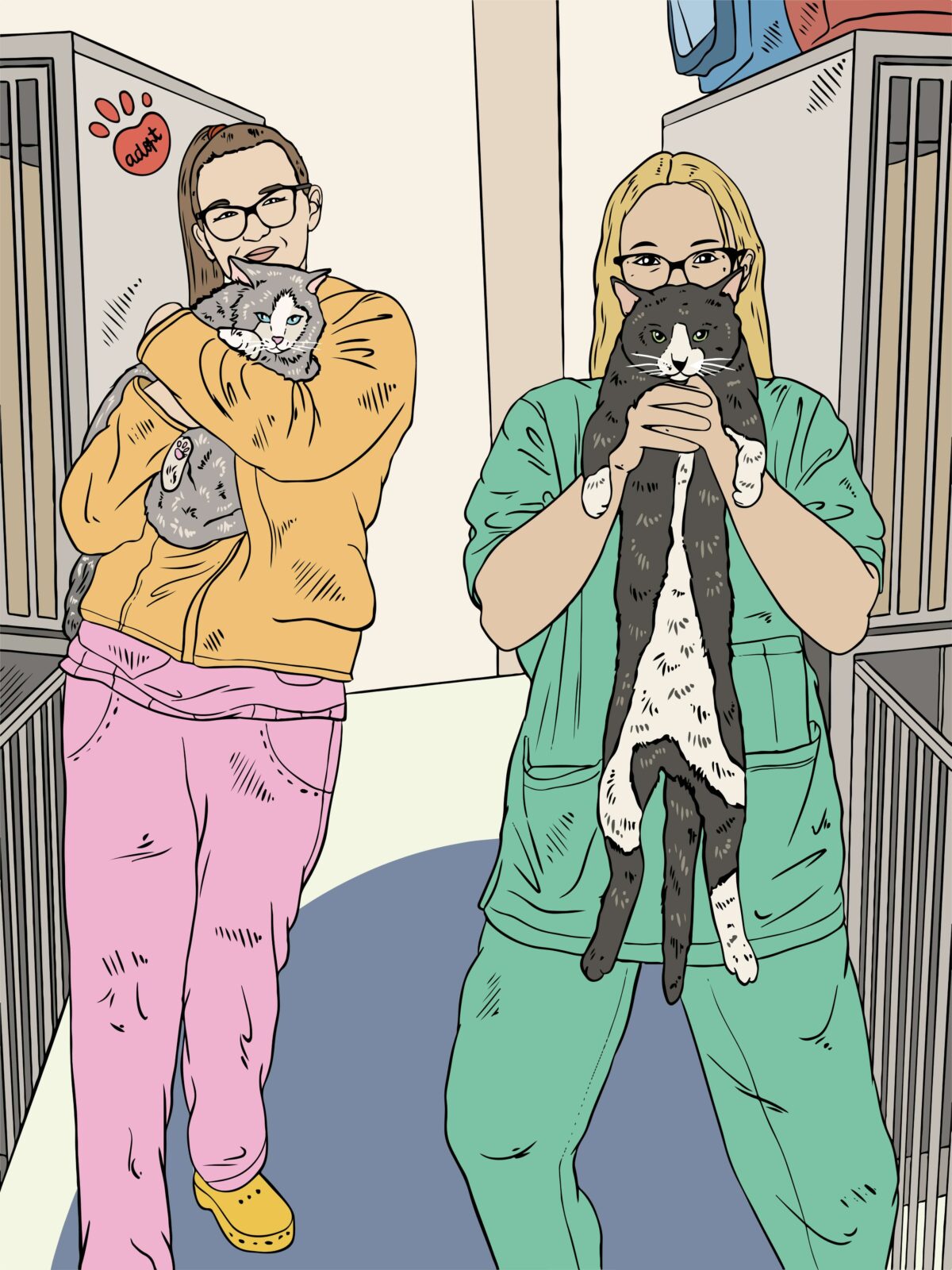 two vet assistants holding cats and smiling